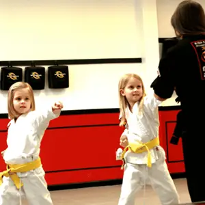 Kids practicing martial arts in Fairfield class for self-defense and confidence building.